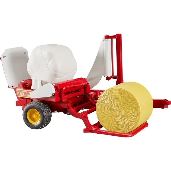 Bruder Ballenwickler Mit Ockerbraunem Und Schwarzem Rundballen, Modellfahrzeug 1 Bruder Ballenwickler Mit Ockerbraunem Und Schwarzem Rundballen, Modellfahrzeug
